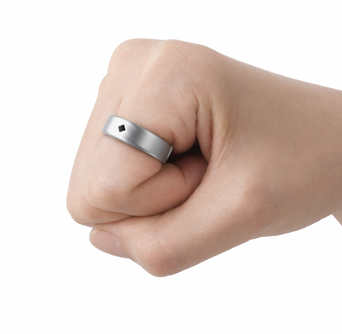 Hand making a fist while wearing the sizing ring
